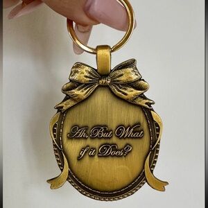 Gold Bow Keychain ah but what if it does?